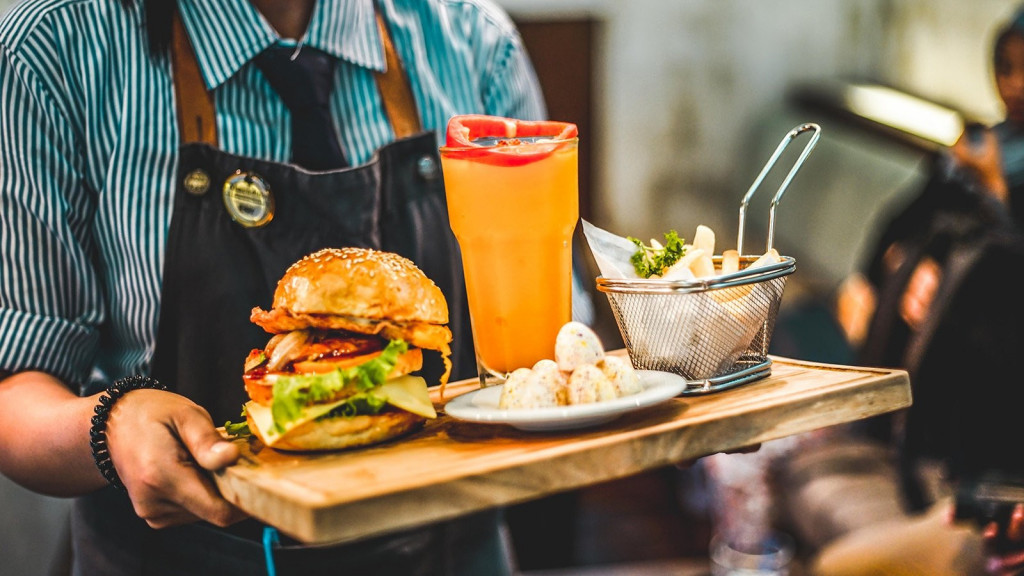 restaurant service - waiter serving food